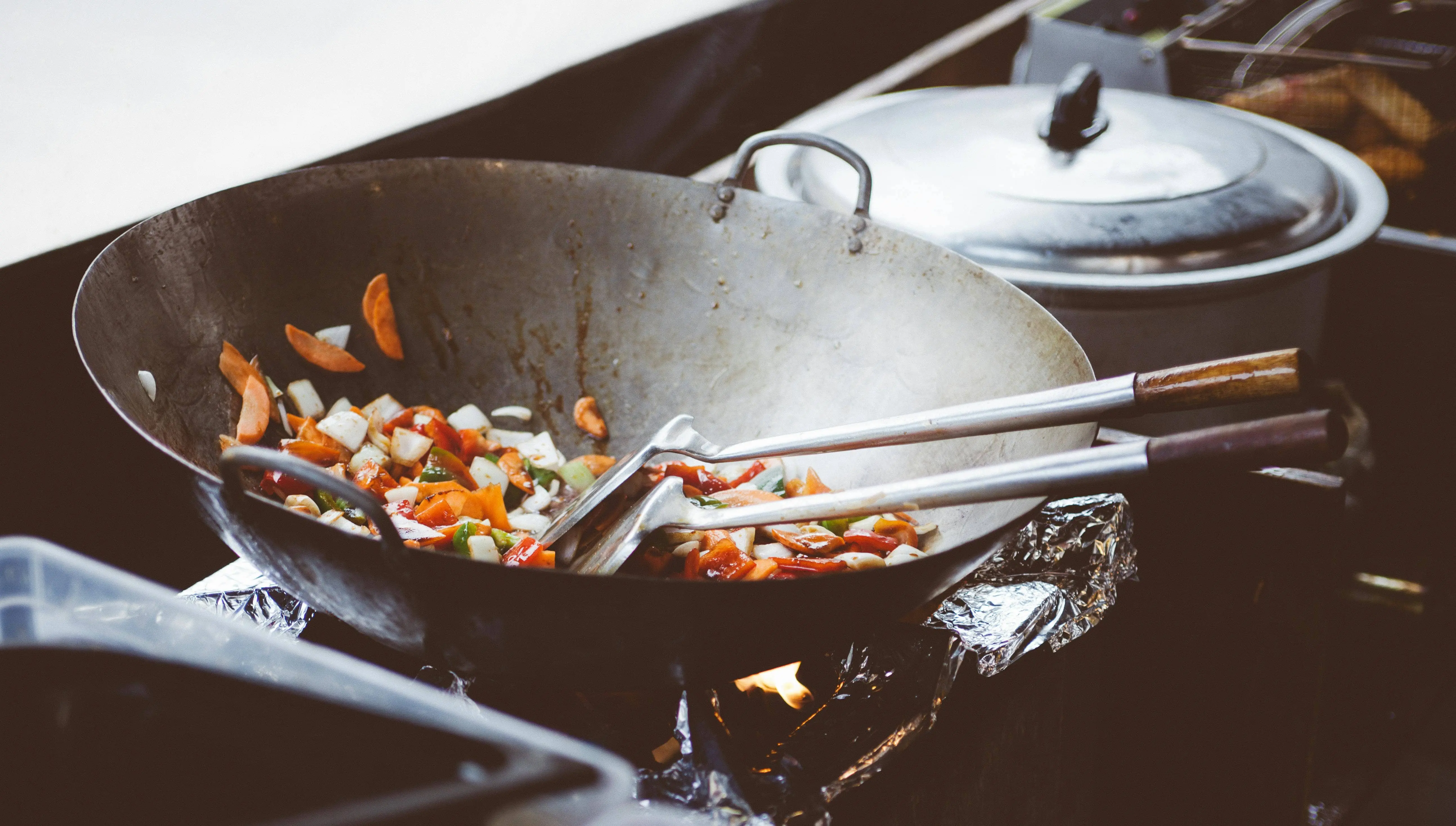 person cooking pan